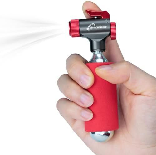 CO2 inflator with integrated safety lock