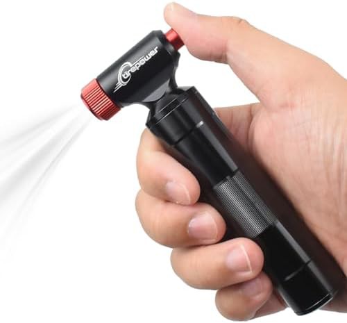 CO2 inflator with cartridge storage canister
